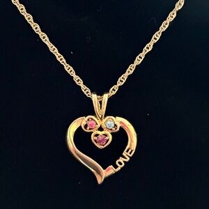 Gold Tone Heart Pendant Necklace.
